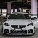 SooQoo BMW G87 M2 Ultra Aggressive Front Bumper Trim In Gloss Carbon Fibre